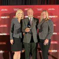 Sharon Rinehimer, Bill Svec and Astrid Vonoetinger accepting the Business of the year award